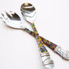 Multi-colored beaded serving spoon and fork set made by artisans at Children's Cup in Eswatini.