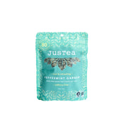 Tea package with 'JusTea' branding on a white background
