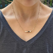 White, Gold, and Black Bead Necklace - FMSCMarketplace.org
