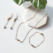 White, Gold, and Black Bead Earrings - FMSCMarketplace.org