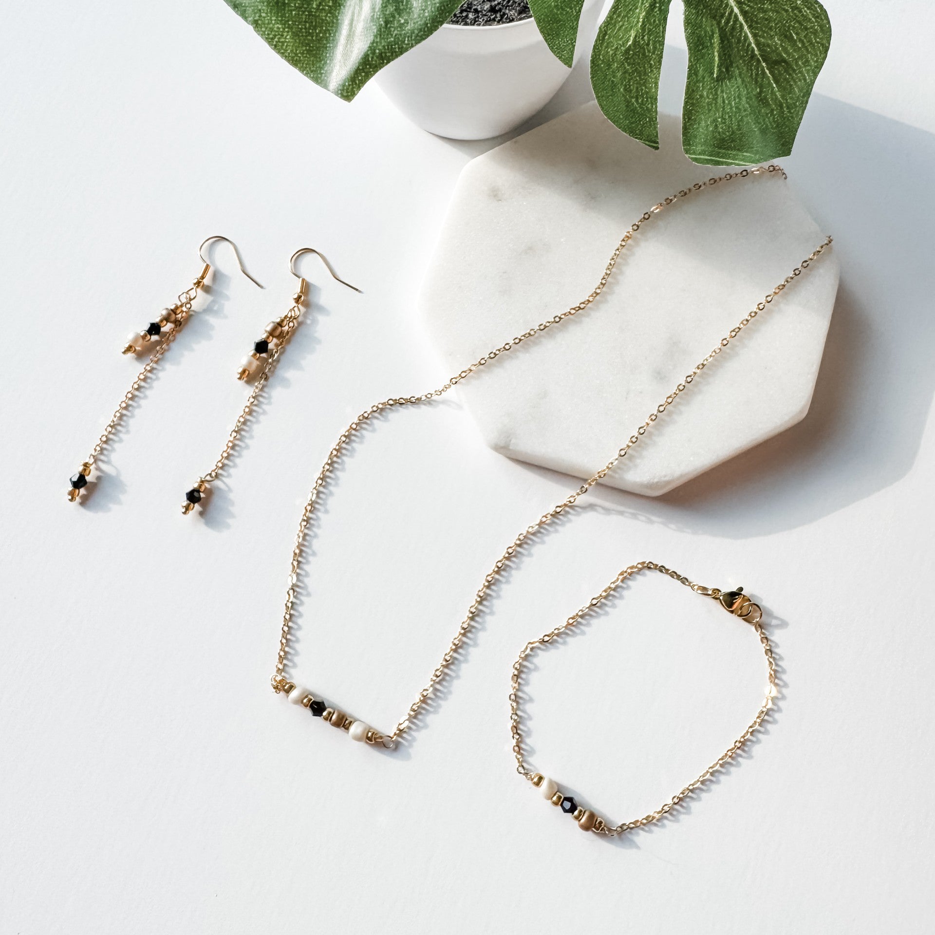 White, Gold, and Black Bead Bracelet - FMSCMarketplace.org