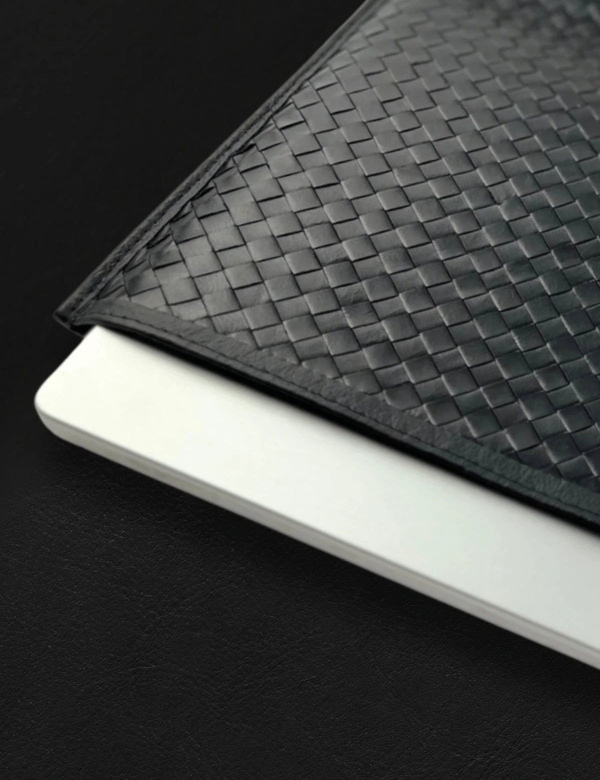woven-laptop-case-black-corporate-goods_e3d63a00-bc82-4999-9029-a0193b5aaf1e_png.webp