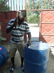 Artisan making oil drum metal art