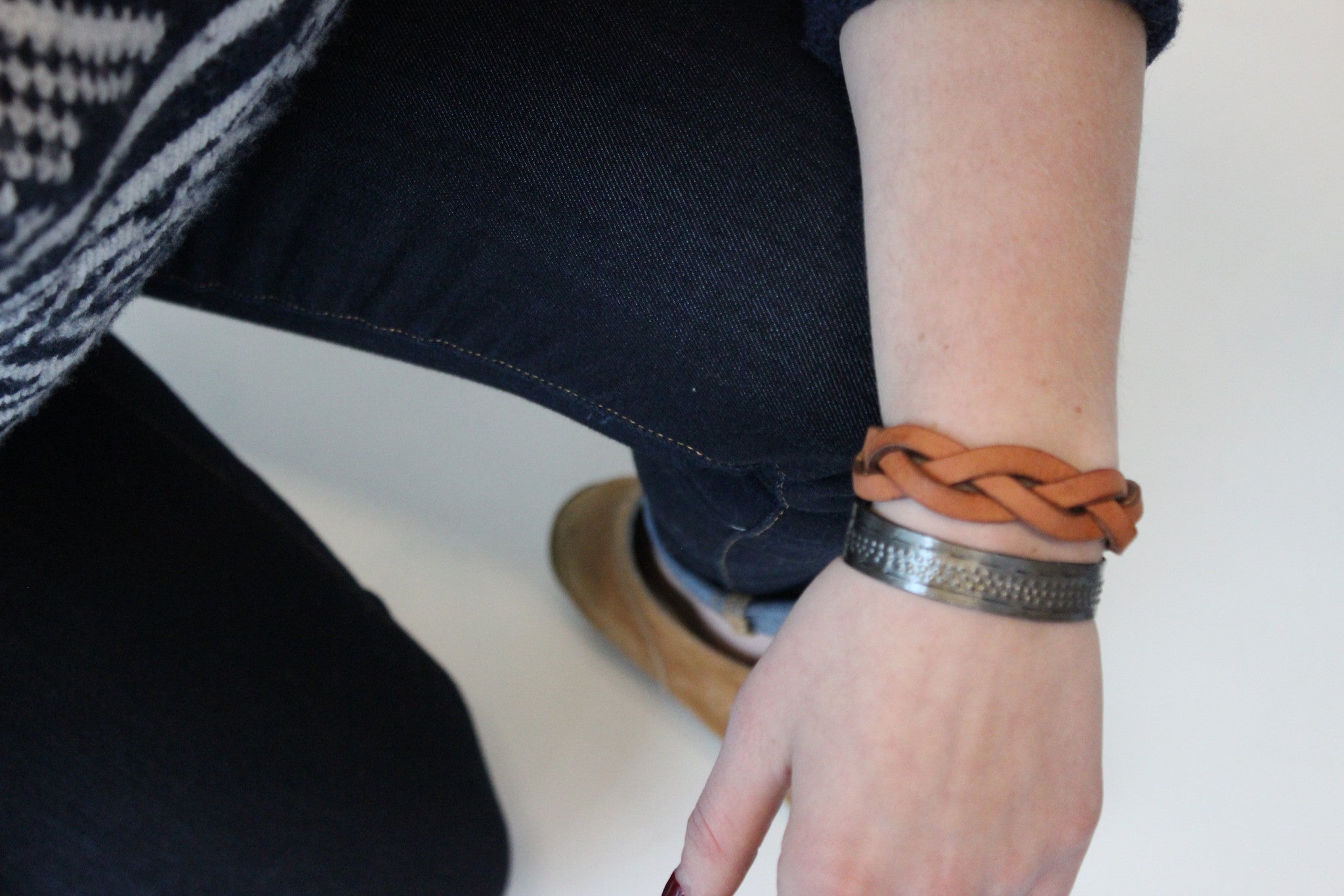 Handmade braided leather bracelet on model