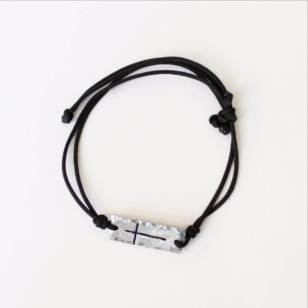 Top view of pewter cross bracelet