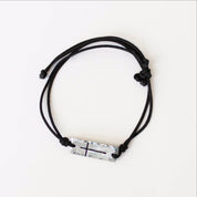 Top view of pewter cross bracelet