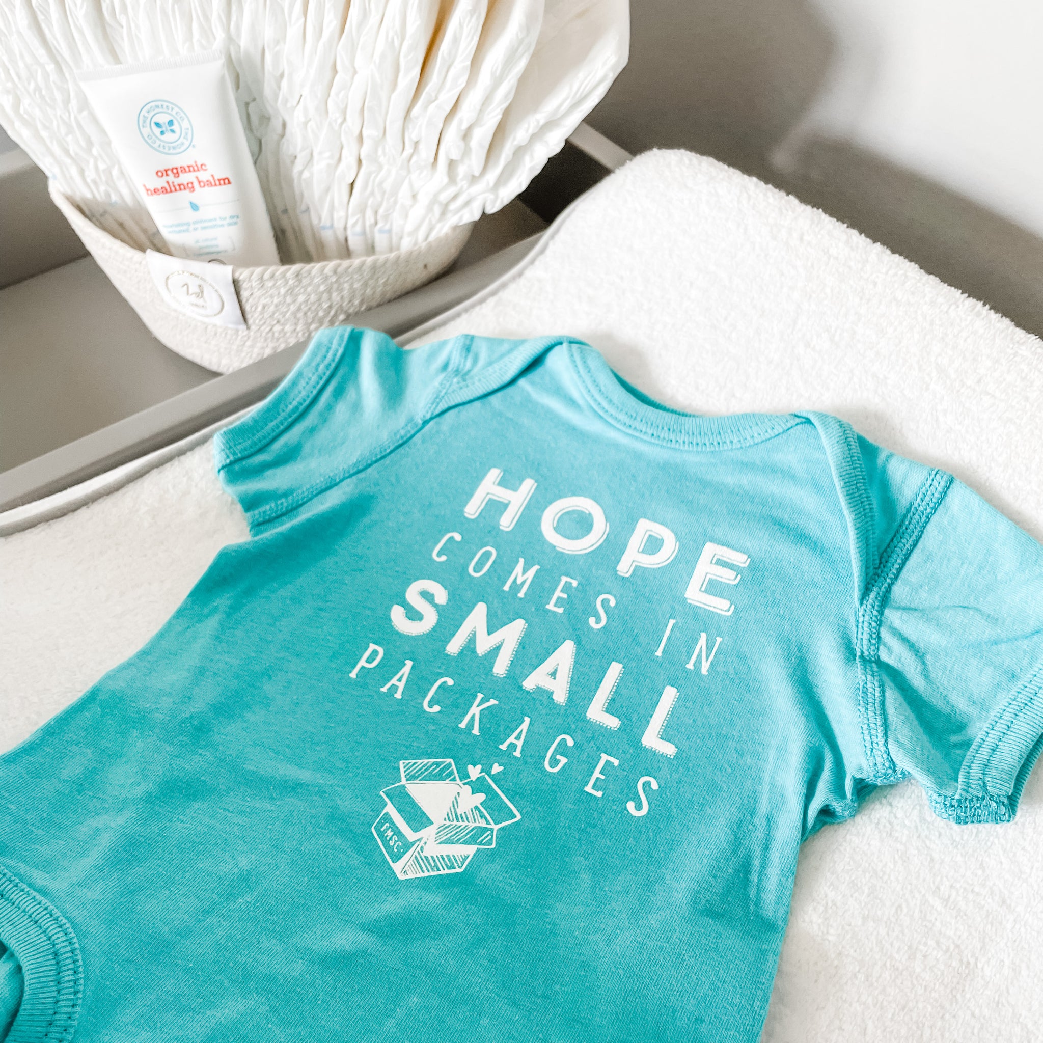 Hope Comes in Small Packages Onesie - Teal - FMSCMarketplace.org